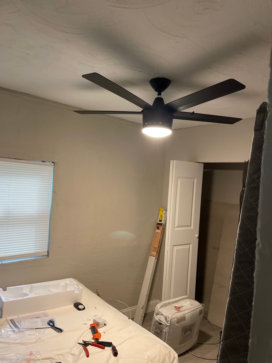 Black ceiling fan installation