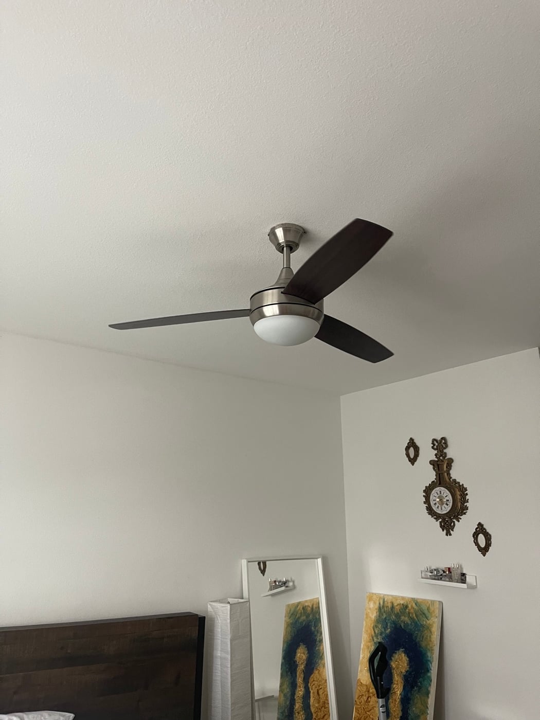 Brushed-nickel ceiling fan installation