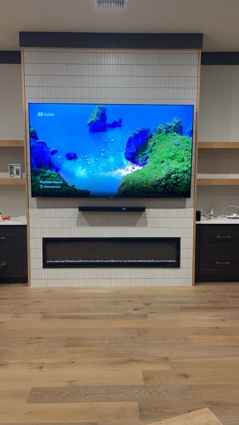 TV mounted on a custom feature wall